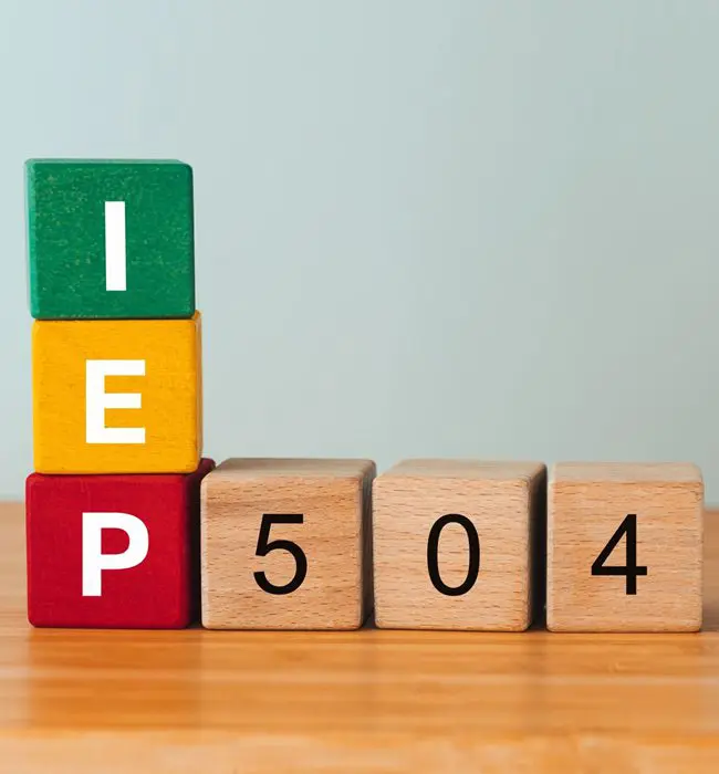 A table with blocks that spell out iep 5 0 4.